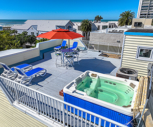 Relax on a Rooftop Sundeck in a Hot Tub!